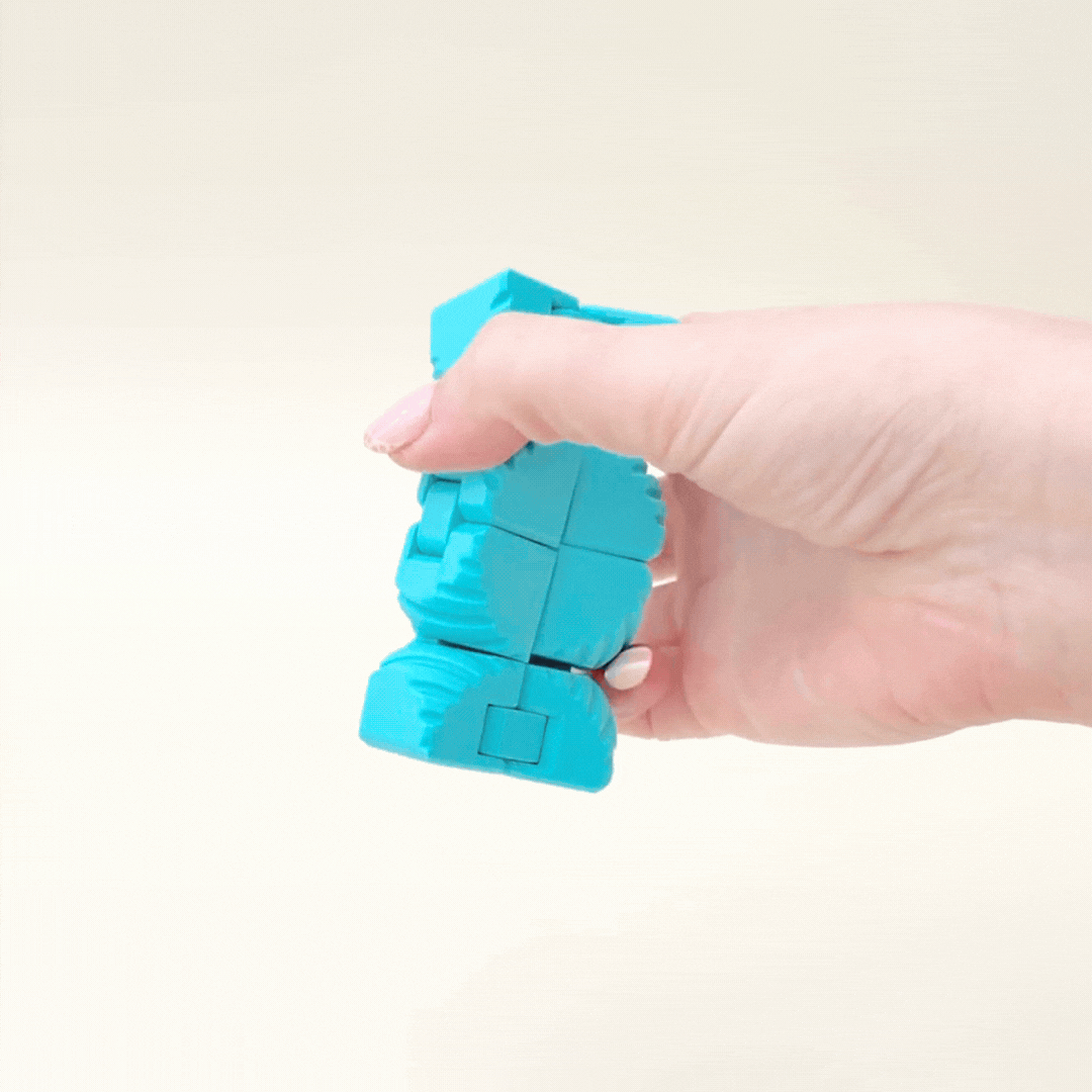 Portable flip and fold sensory fidget with grooved ridges for tactile tracing, great for travel, commuting and waiting rooms
