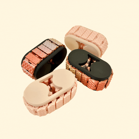 A textured roller fidget toy with a dragon-scale design, perfect for sensory stimulation.
