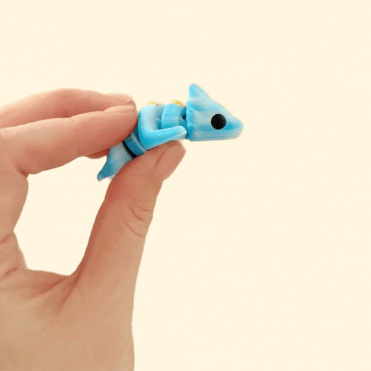 A moveable dragon fidget toy designed for tactile sensory play and stress relief.