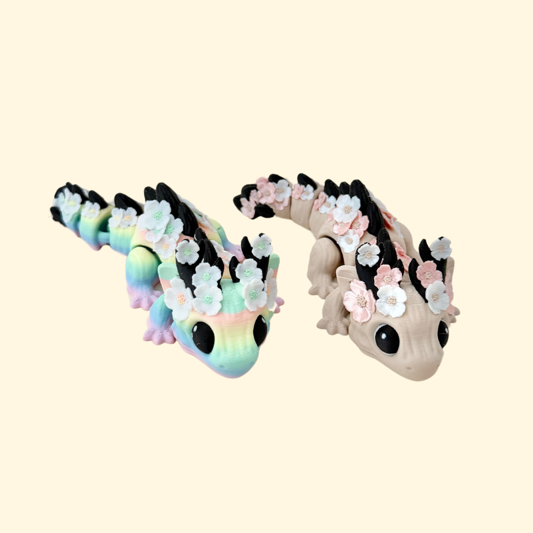 A Floralyn Dragon fidget toy featuring a detailed floral design, fully articulated for sensory play and display purposes.