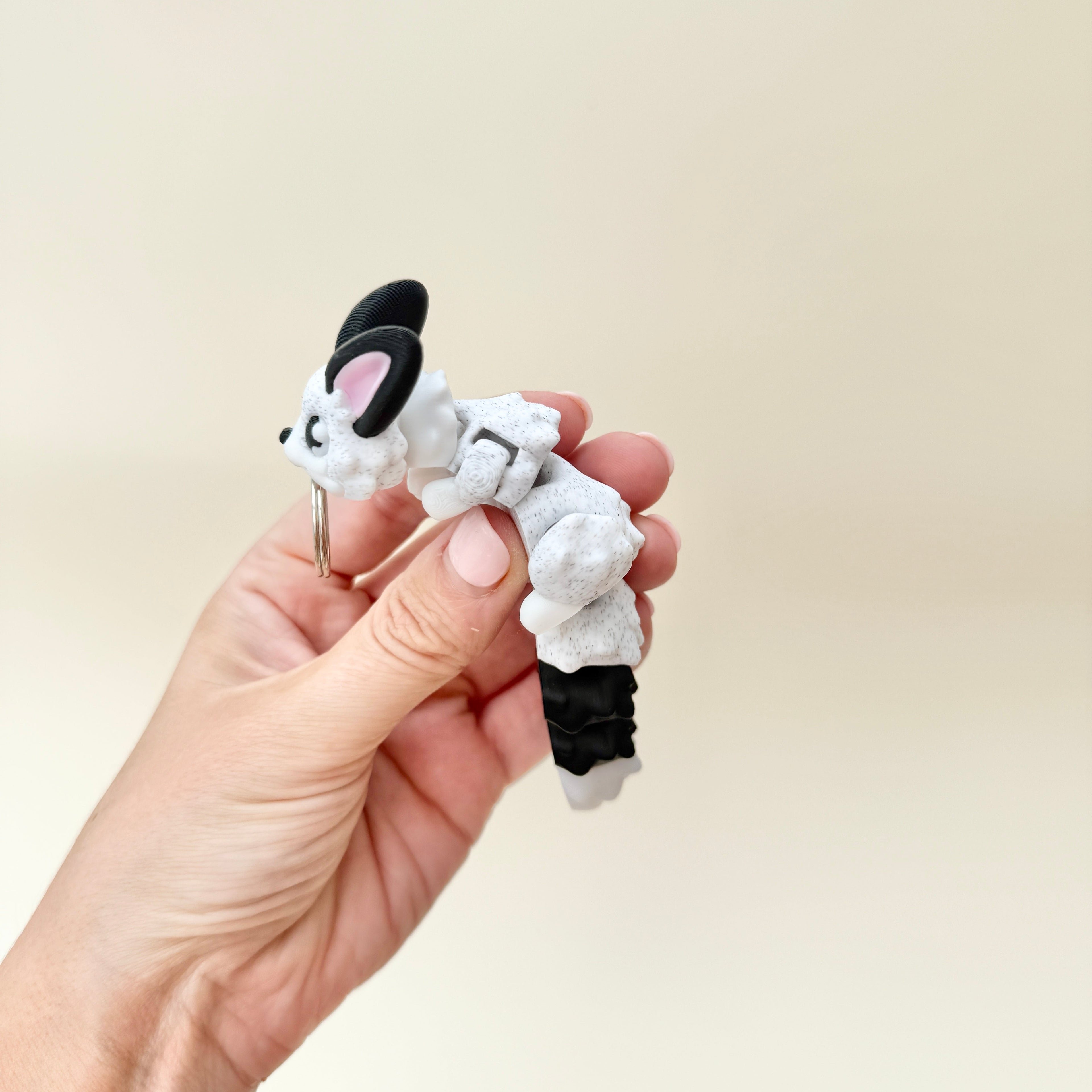 animal fidget with raised details and keyring attachment for on-the-go play
