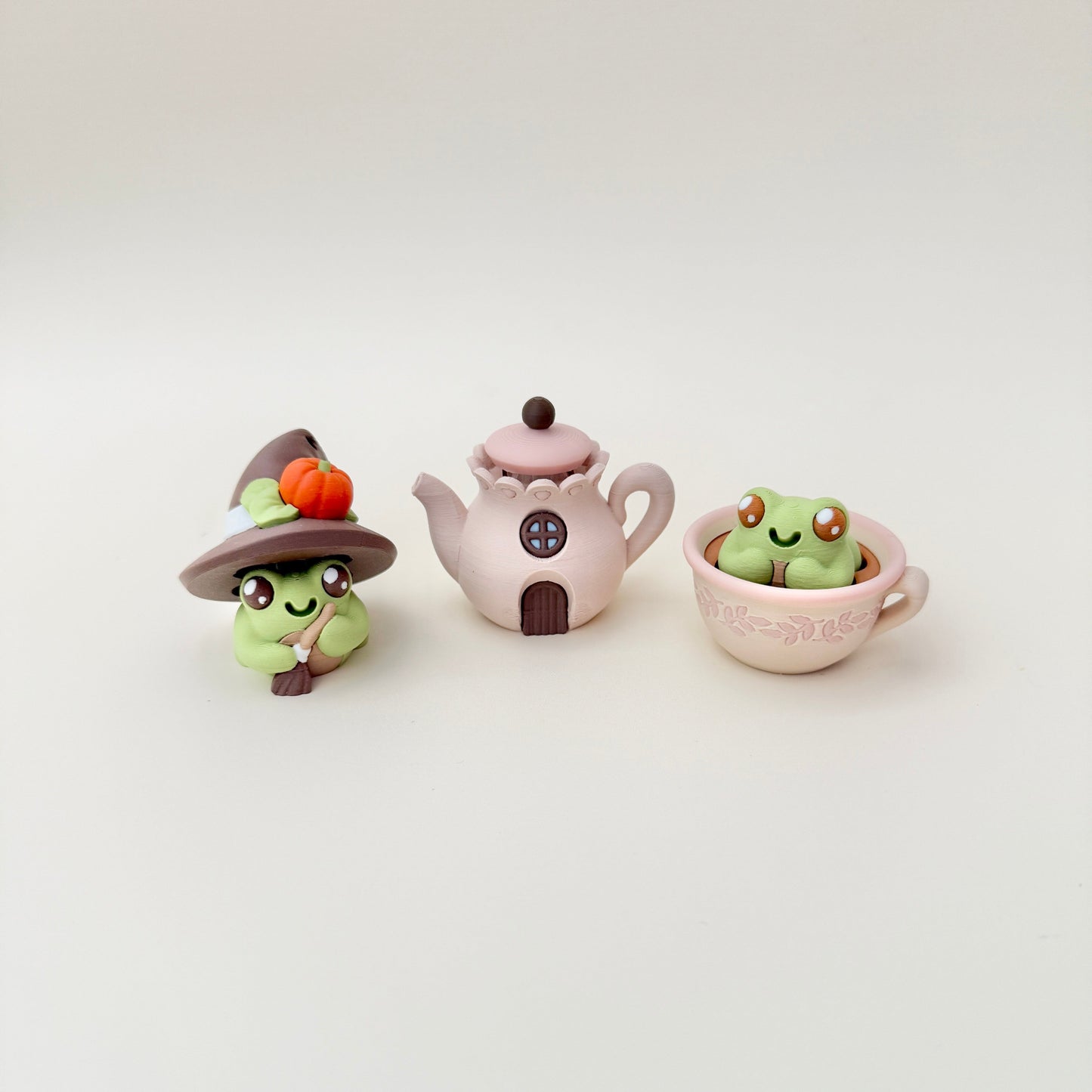 Teapot clicker that pairs with our frog and cottage-themed fidgets for collectors.