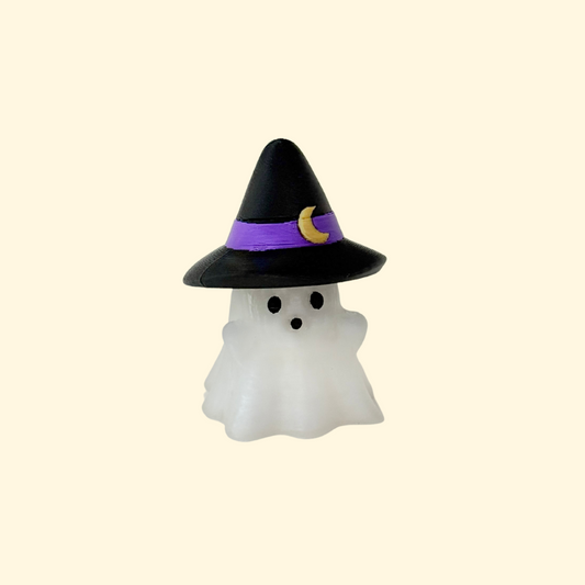 Small frosted ghost with a black witch hat and a keyring hole for lanyards and keys.
