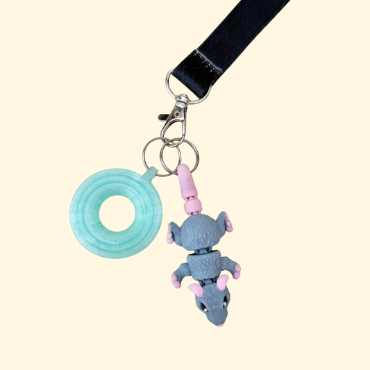 Articulated rat sensory add-on with moving head, body, feet and tail for satisfying everyday stimming.
