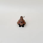 Playful poop keyring with articulated legs for fidgeting, perfect for teachers, carers and anyone who loves a laugh.

