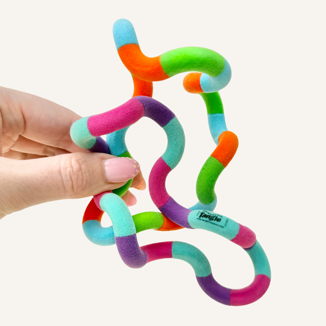 Virtually silent fuzzy textured twist fidget with endless movement for calm hands, focus and sensory regulation.
