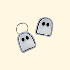 Halloween ghost-themed clicker fidget toy with keyring attachment
