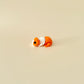Ginger and white guinea pig fidget toy with a fully flexible body, ideal for stress relief.