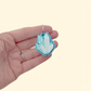 Crystal-style keyring fidget in blue and white; clean press feedback; portable and classroom friendly with quiet option.
