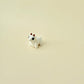 White goat fidget toy with brown horns and black eyes, ideal for desk or pocket use.