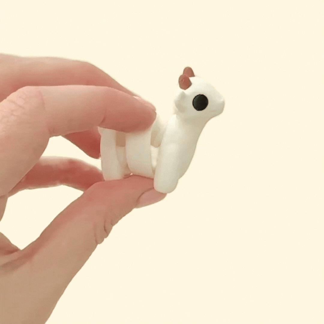 Small, flexible goat fidget toy with a smooth finish, perfect for on-the-go fidgeting.