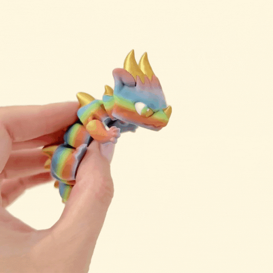 Grumpy articulated dragon fidget with rainbow colour