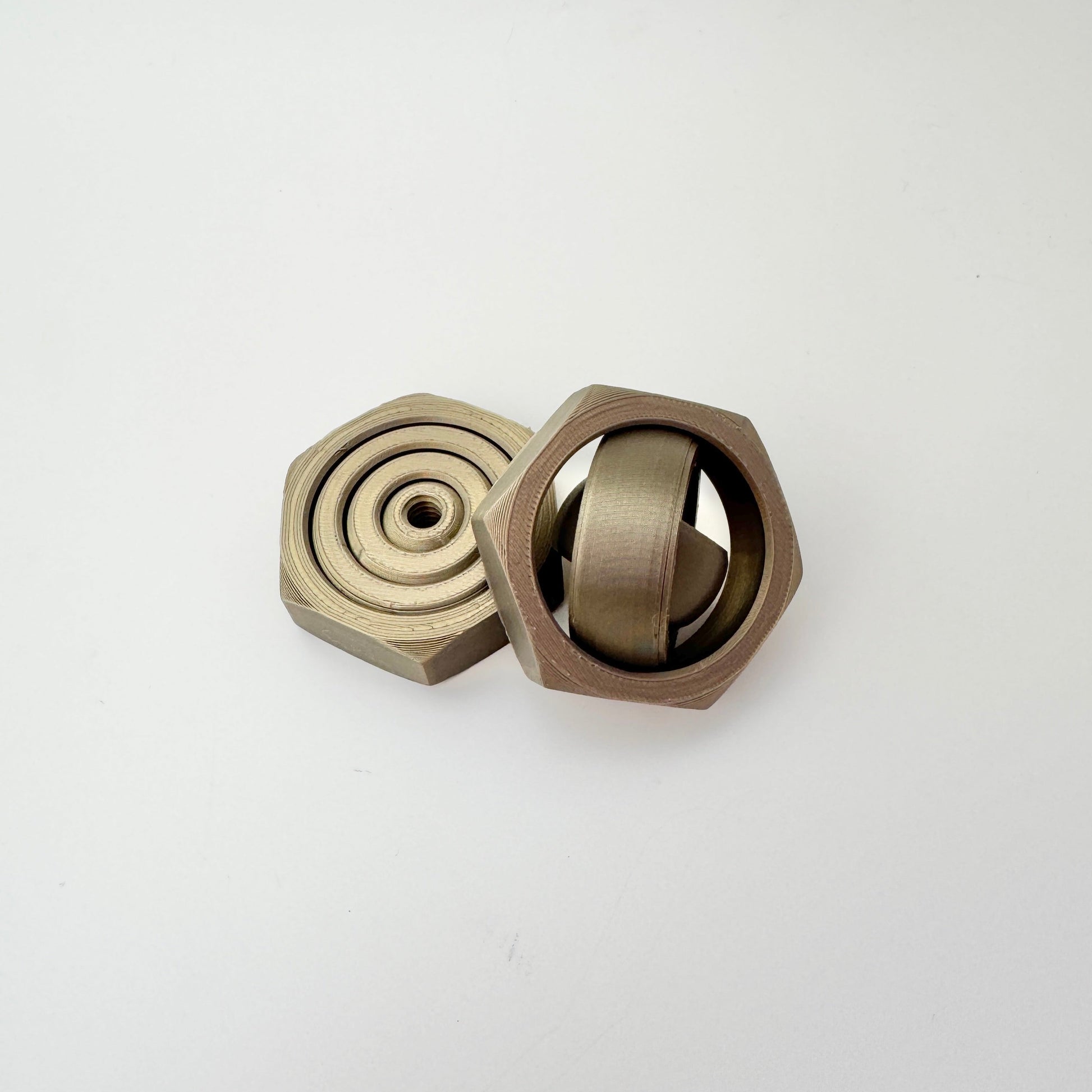 Six-sided nut body offers secure pinch grip and pressure-stim edge.
