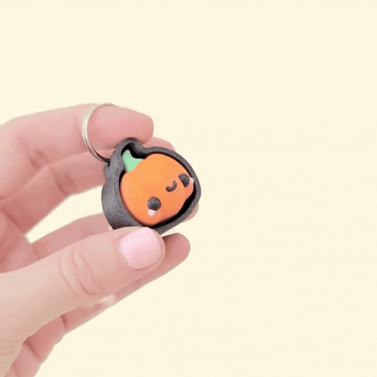 small pumpkin clicker designed for on-the-go stimming and focus
