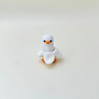 Bright novelty clicker fidget designed for pocket use, tactile engagement, and focus support.
