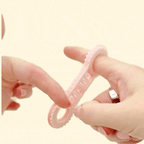 Two-finger fidget tool designed for discreet, portable use, helping with focus, tactile need, and movement.