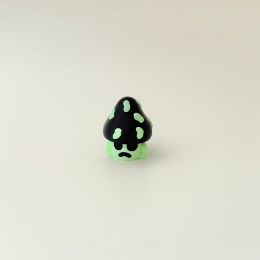 portable mushroom clicker featuring raised textures and a press-to-pop mechanism
