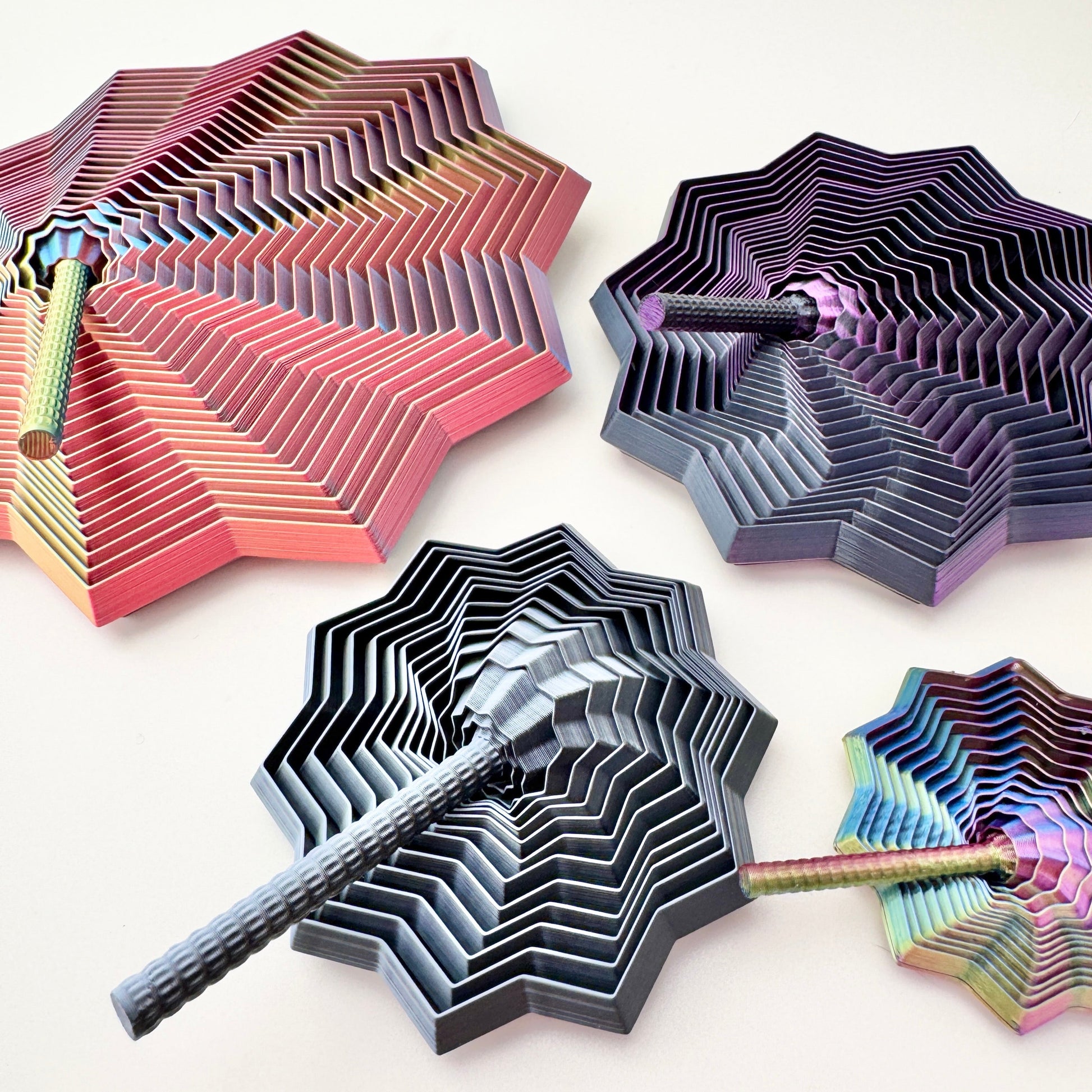 Central handle lets you twist, sweep, and lift to create wave-like motion.
