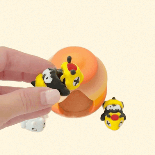 Bee fidgets with matching hive accessory for themed sensory play.

