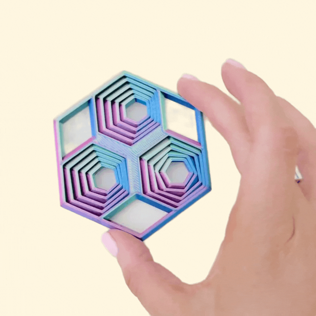 colour-changing hexagon shapeshifter fidget for visual stimming and focus
