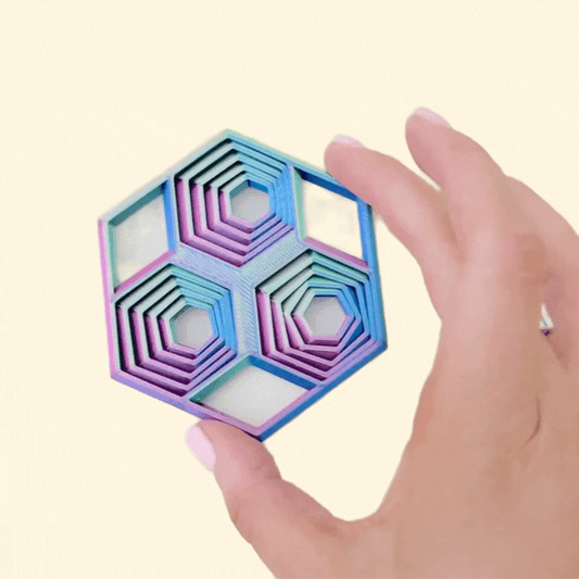 colour-changing hexagon shapeshifter fidget for visual stimming and focus
