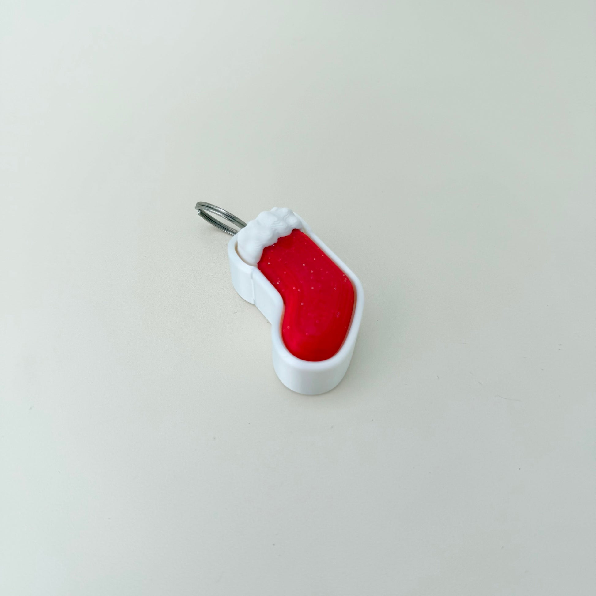 Christmas stocking fidget with keyring attachment, clean click action and tactile feedback; great for focus on the go.
