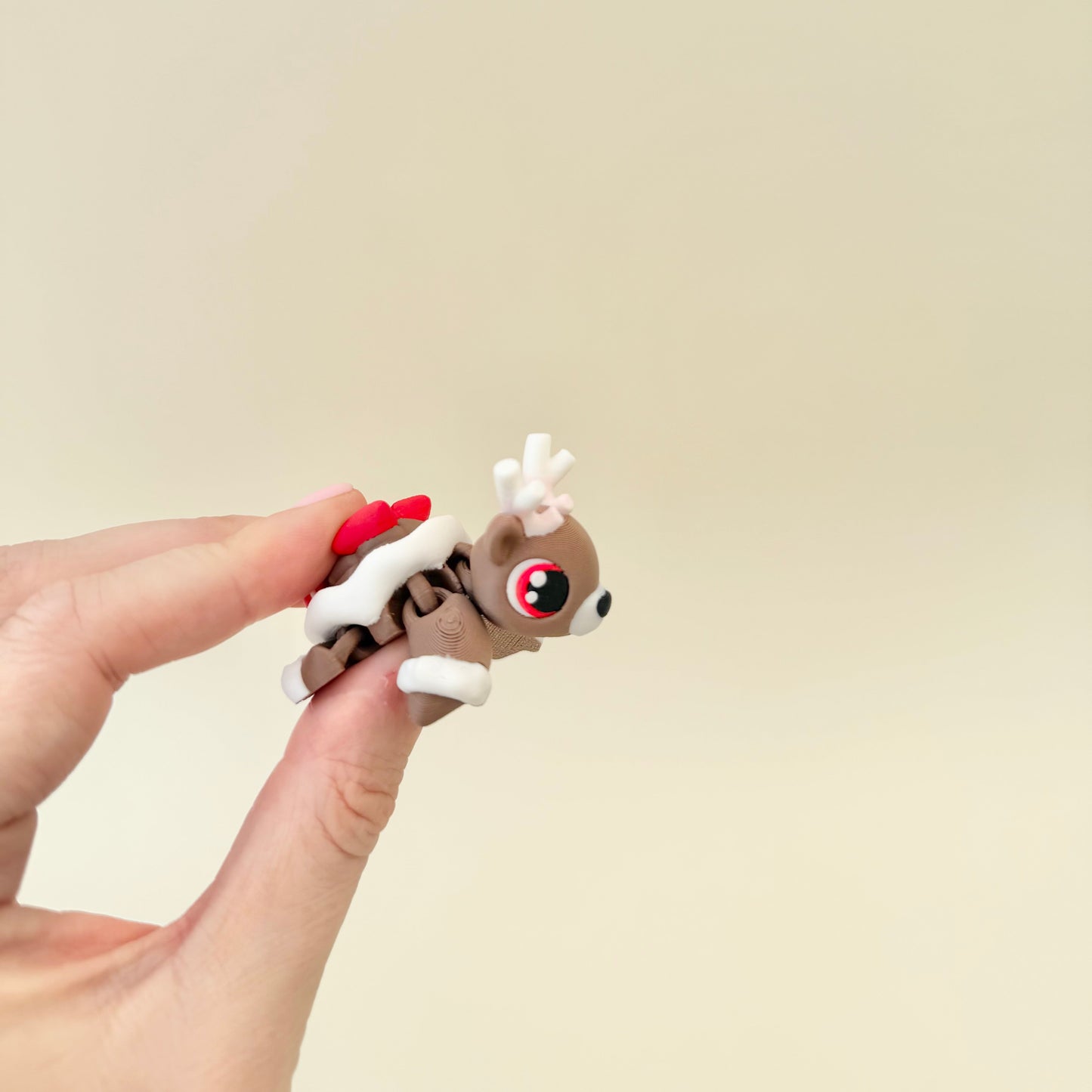 A festive mini turtle with gentle articulation and textured features for calming tactile engagement.
