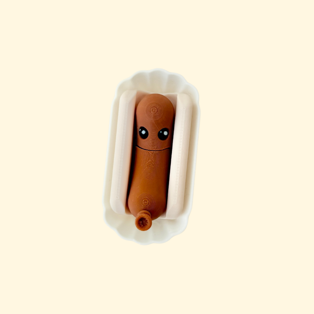 novelty hotdog fidget with removable bun and display tray for quiet play

