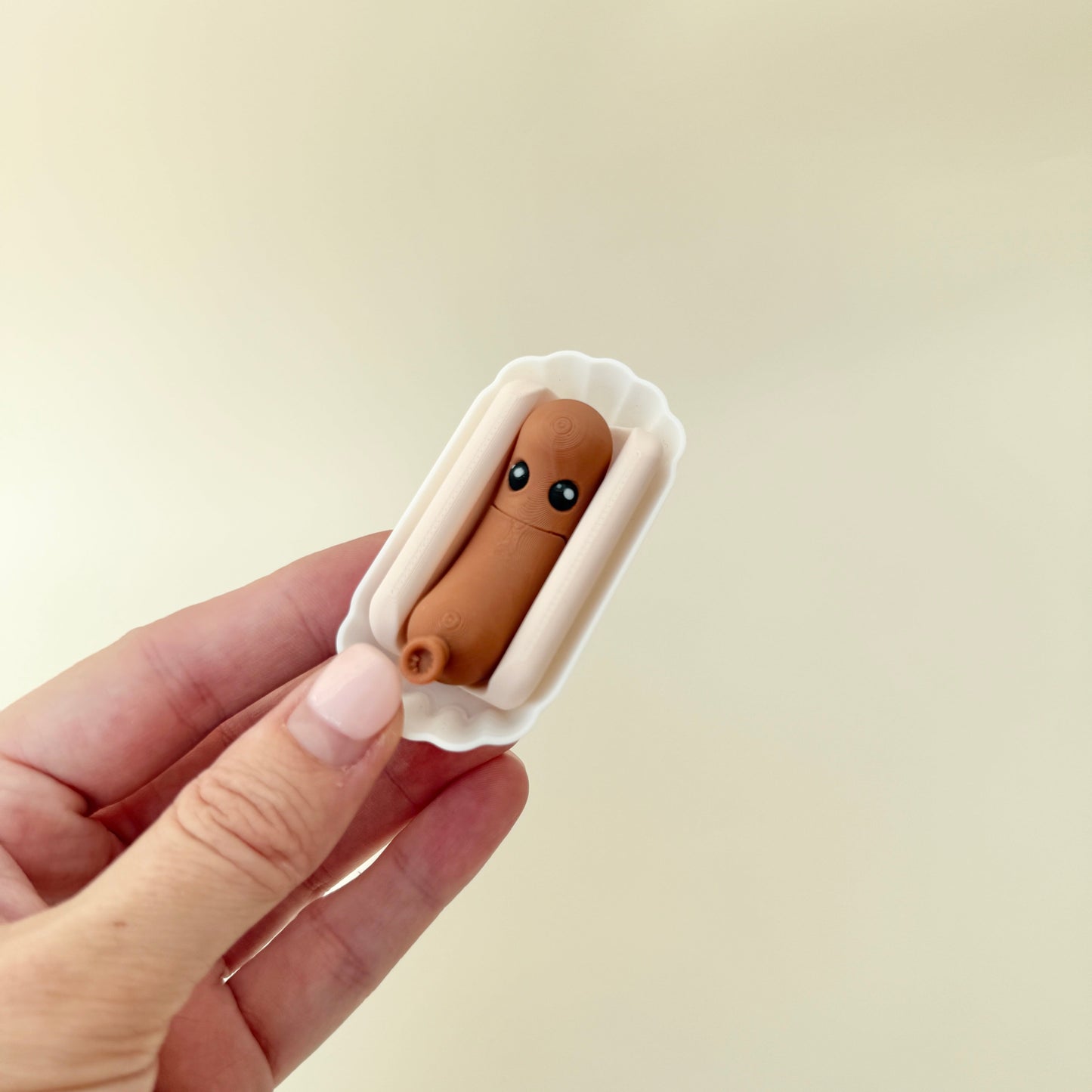 novelty hotdog fidget toy with textured surfaces for quiet stimming
