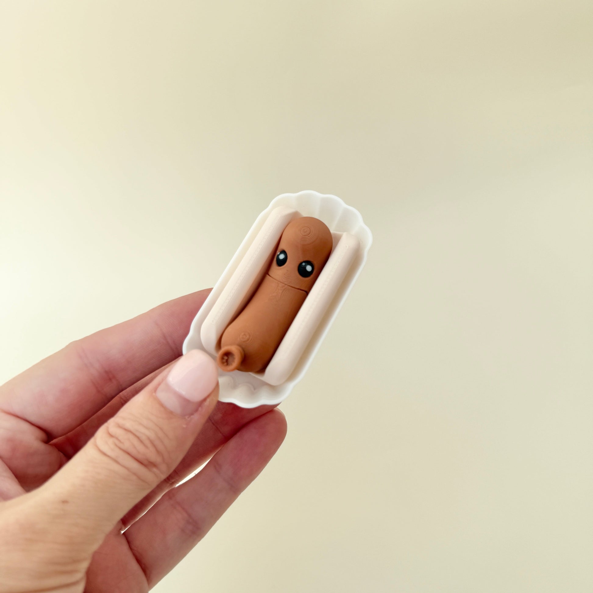 novelty hotdog fidget toy with textured surfaces for quiet stimming
