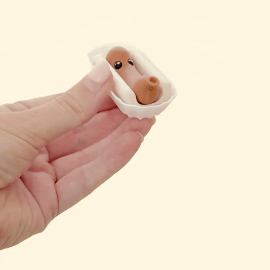 handheld food-themed kinetic fidget with opening mouth for repeatable stims
