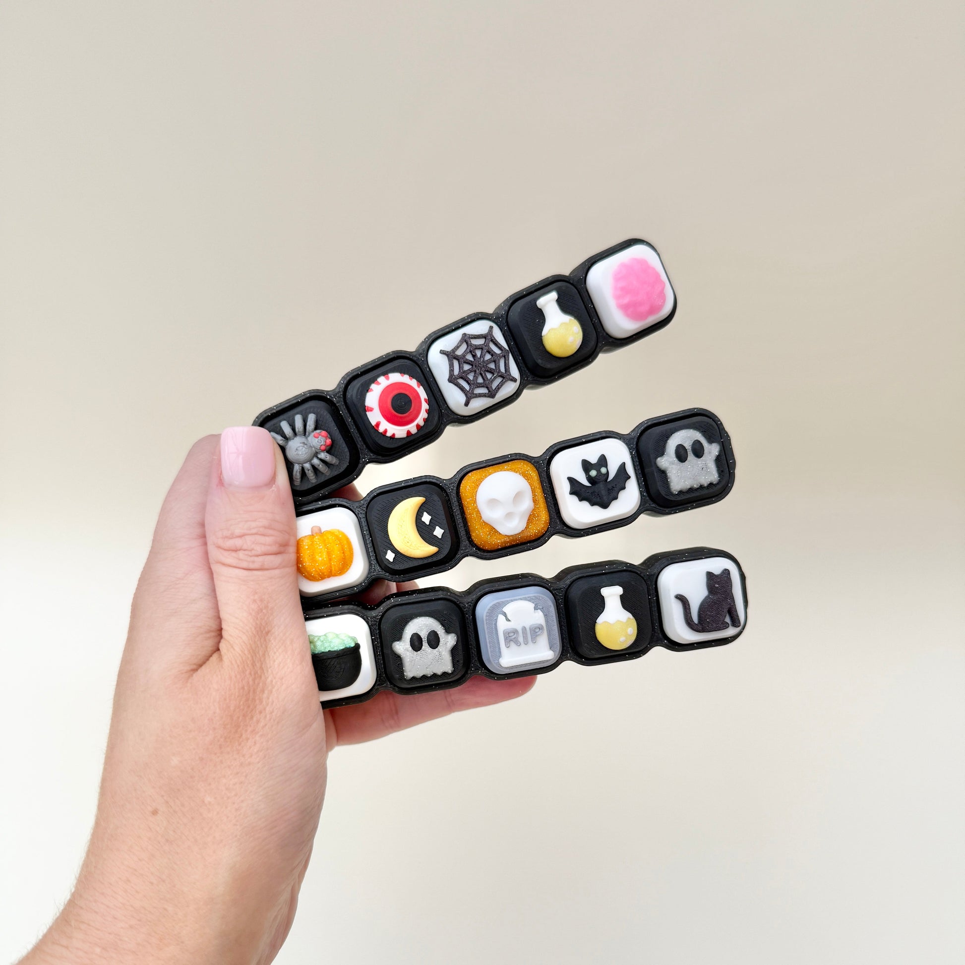 portable five button fidget for tracing and stimming
