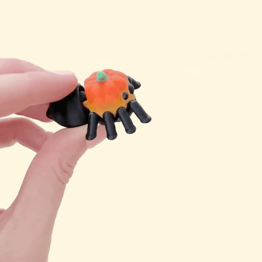 compact spider pumpkin fidget with keyring attachment for bags and lanyards

