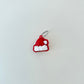 Christmas hat clicker designed for keys or lanyards; satisfying press with traceable details.
