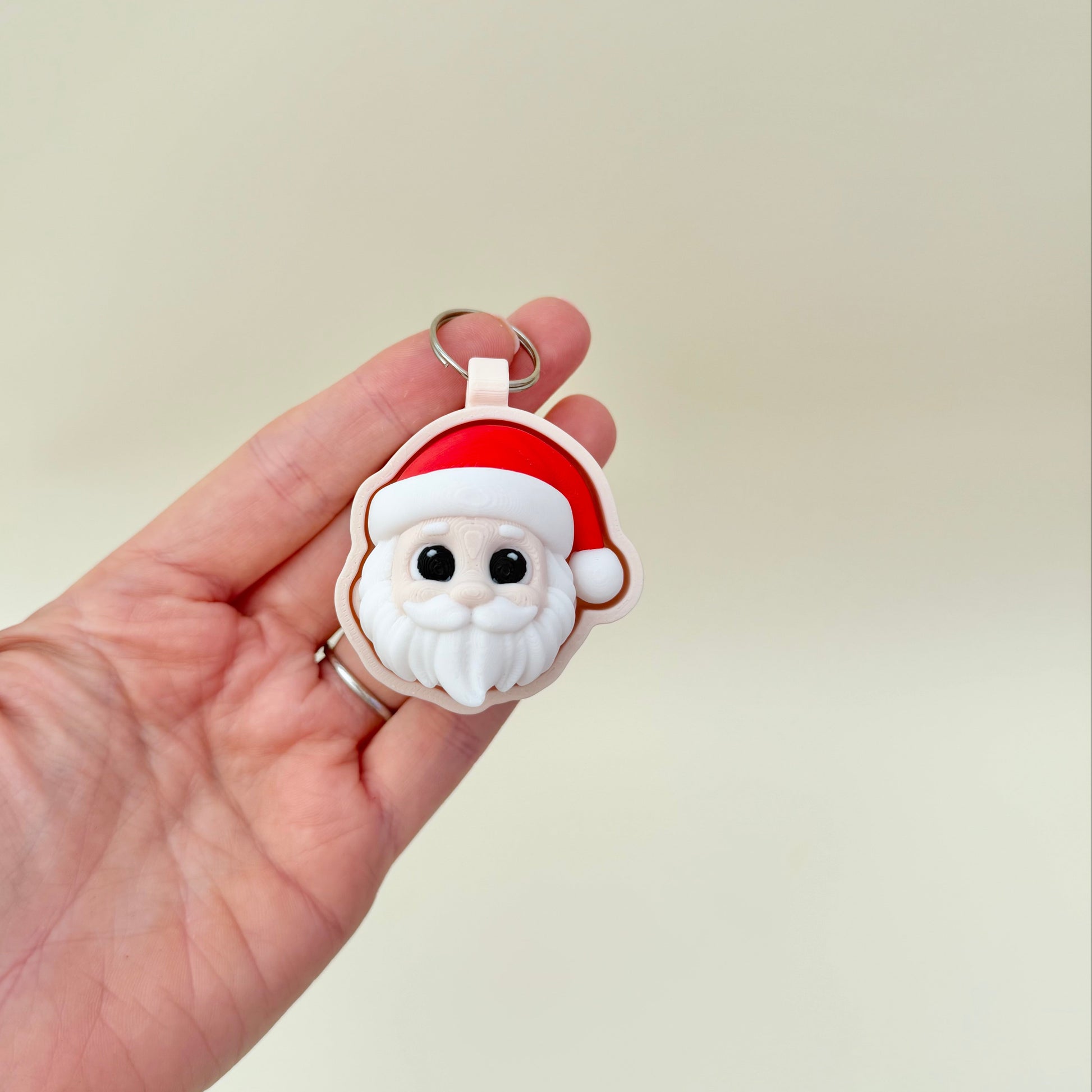 Santa-themed click fidget, sturdy 3D build, portable with loop, choice of click or quiet for classrooms.
