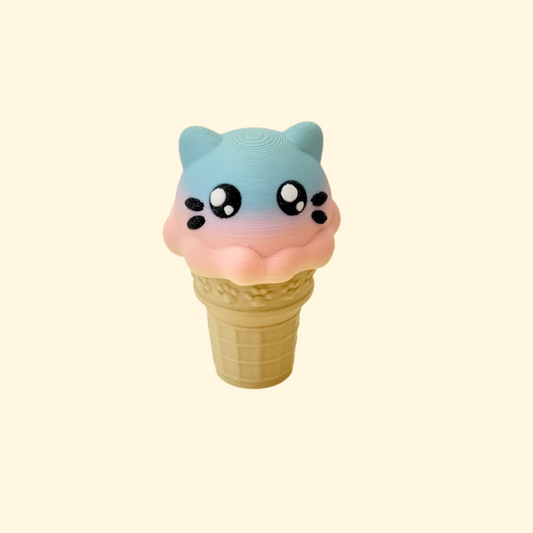 Cute fidget clicker shaped like a cat ice cream cone, rainbow finish and sensory design

