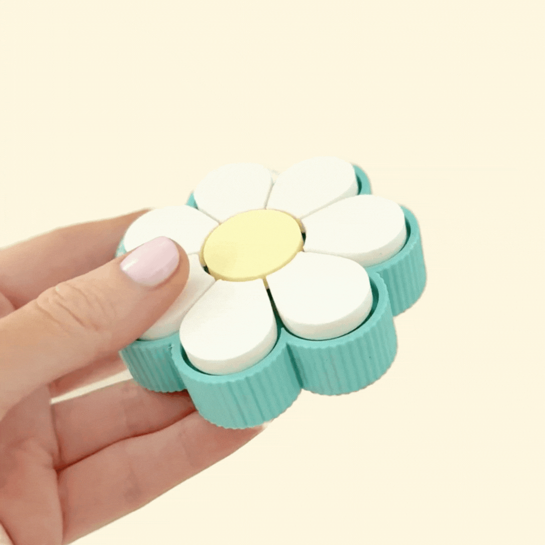 Multi-click flower sensory toy designed with eight individual clickable sections for satisfying sensory play.