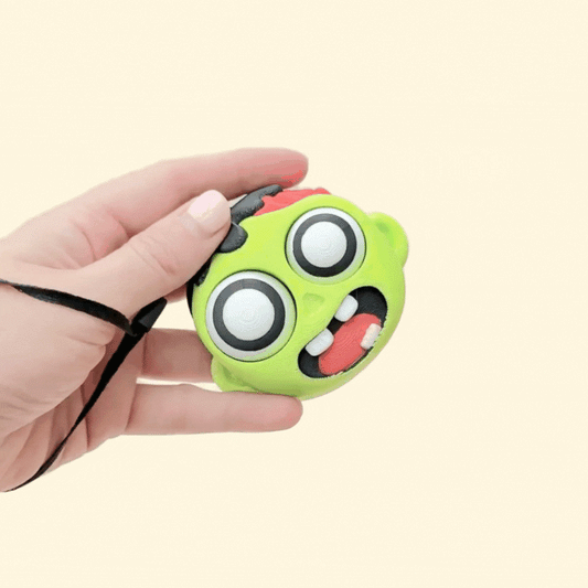 oversized clicker with raised textures and a classic pop sound for sensory use
