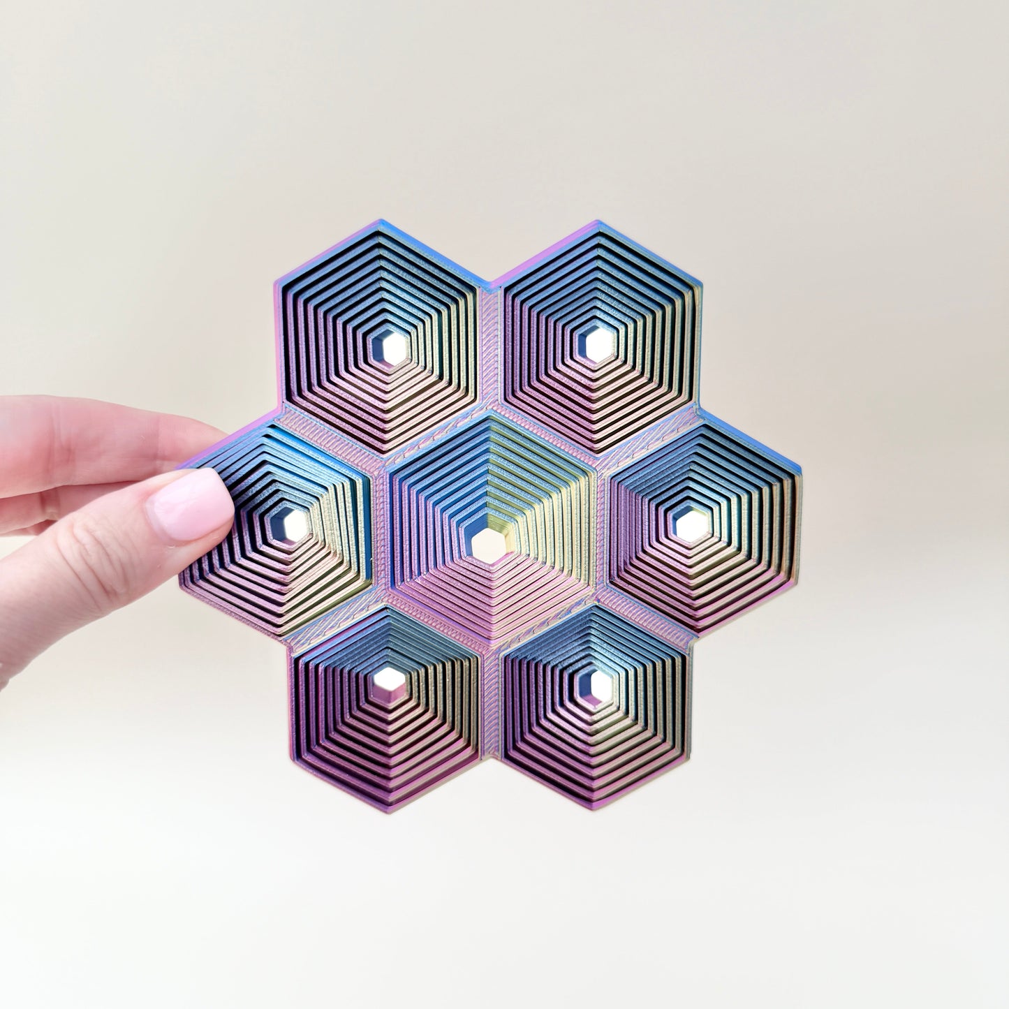 Raised ridges and smooth movement provide tactile feedback for sensory play.
