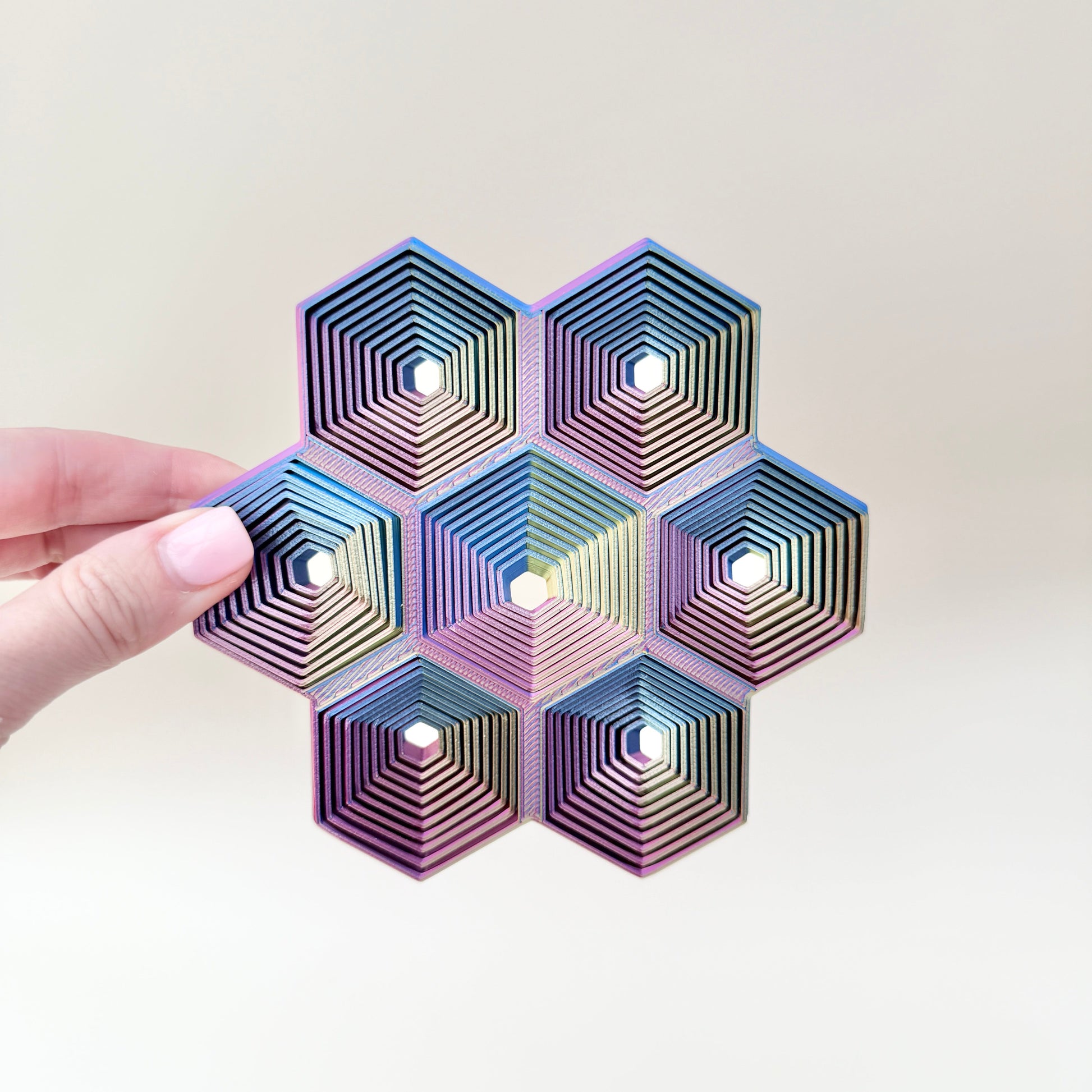 Raised ridges and smooth movement provide tactile feedback for sensory play.
