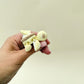 Small articulated turtle with a lemon pie shell and fluted crust detail.
