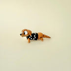  A limited-edition wiggly sausage dog fidget, perfect for anxiety relief and sensory stimulation.