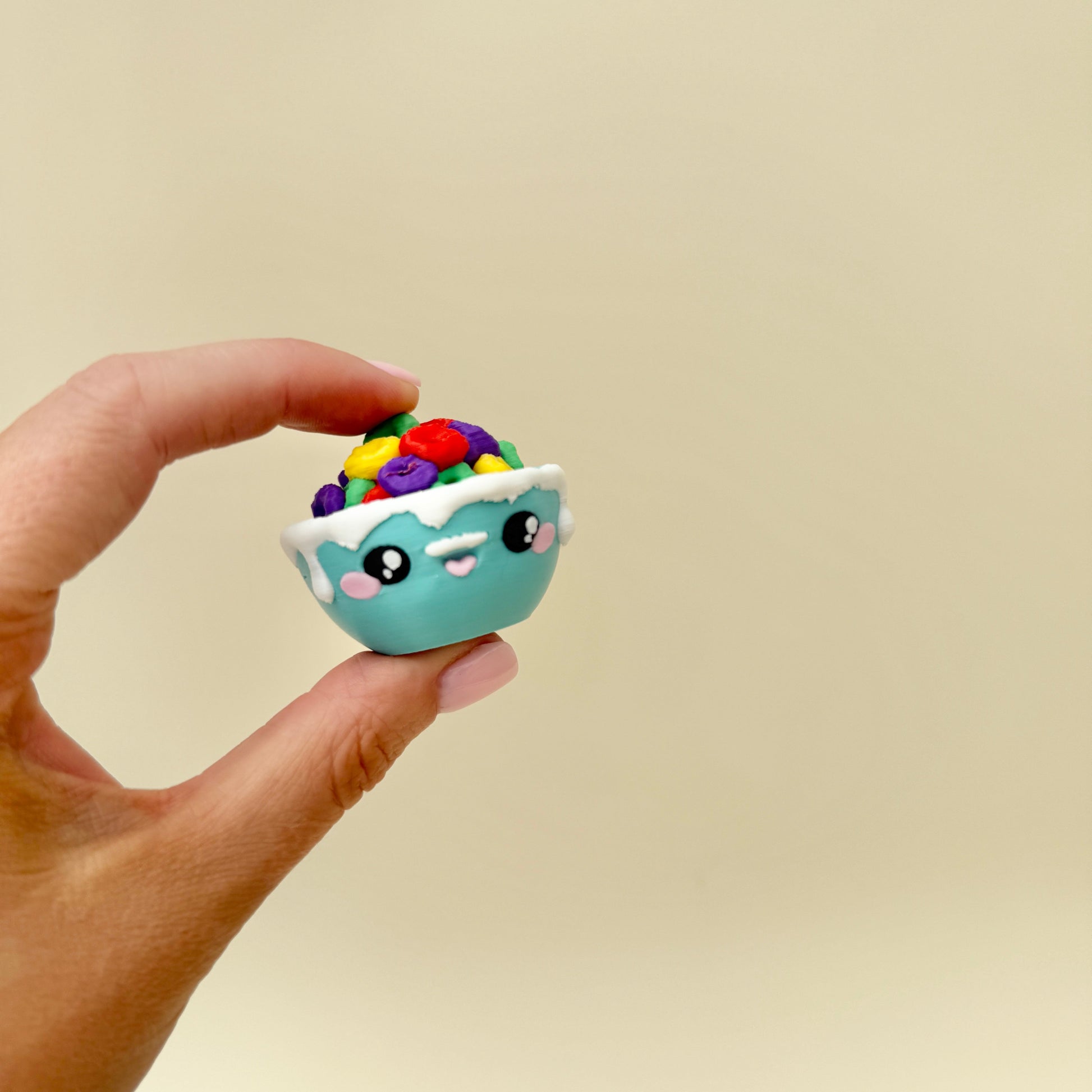 Cereal bowl clicker with soft marshmallow shapes and satisfying click action.