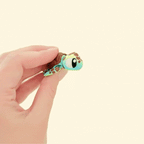 Tactile and portable sea turtle sensory toy with articulated movement and detailed features.
