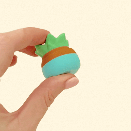 A compact fidget toy designed to look like a potted succulent, perfect for quiet desk fidgeting.