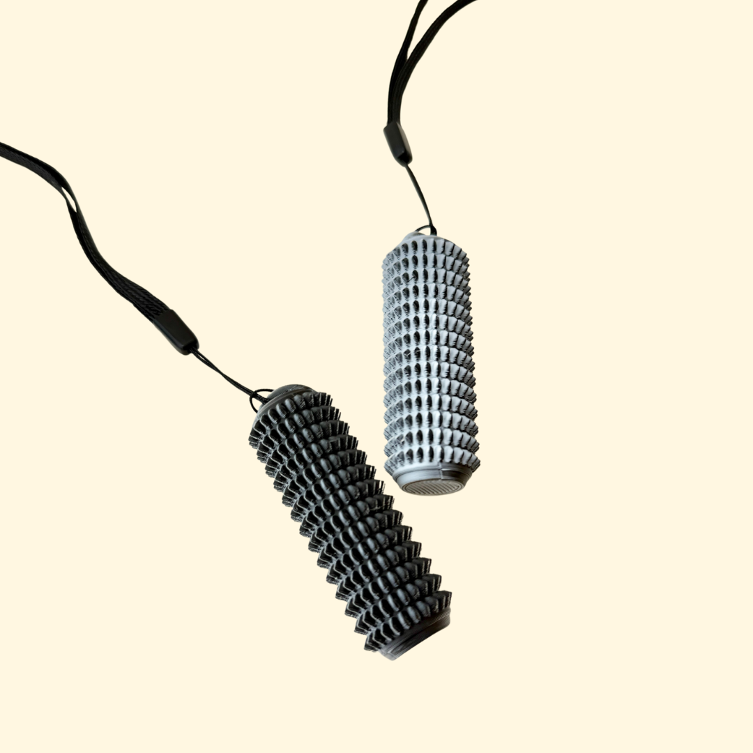 rigid handheld sensory tool with mid-intensity spikes for grounding and pain stimming
