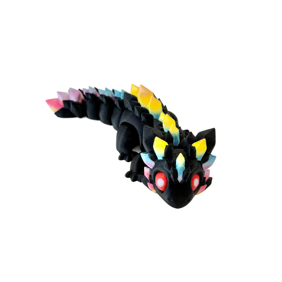 Black dragon fidget toy with rainbow gem-like details and bright red eyes, fully articulated for sensory play.