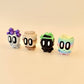 A charming pet rock, ideal as a quirky gift or for neurodivergent-friendly sensory engagement.