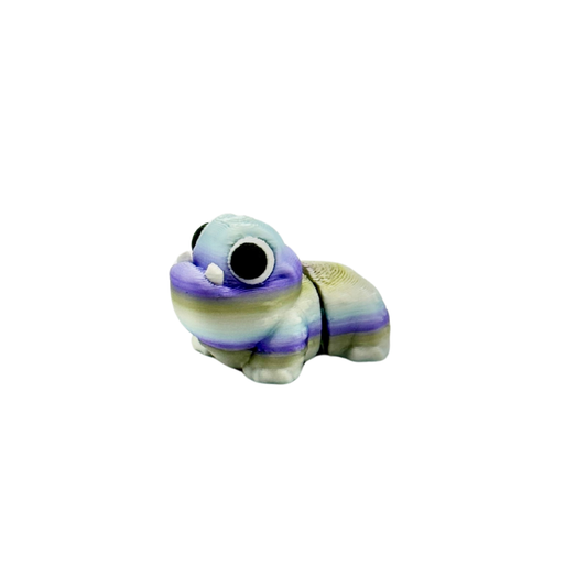Tiny fidget offering soothing tactile input and whisper-quiet motion
