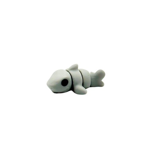 Small articulated fidget for calm tactile input at work or school
